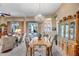 Open concept home showcasing the dining area with the backyard in view at 1557 W Laurel Greens Ct, Anthem, AZ 85086