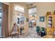 Open dining room featuring views into the kitchen and an adjoining breakfast nook at 1557 W Laurel Greens Ct, Anthem, AZ 85086