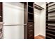 Spacious walk-in closet with custom shelving and ample storage, perfect for organization at 17012 N 57Th St, Scottsdale, AZ 85254