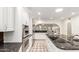 This kitchen features white cabinets, stainless steel appliances, and granite countertops at 17012 N 57Th St, Scottsdale, AZ 85254