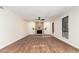 Spacious living room featuring a fireplace and ample natural light at 17012 N 57Th St, Scottsdale, AZ 85254