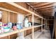 The interior of the shed shows storage shelving filled with a variety of household and gardening products at 17012 N 57Th St, Scottsdale, AZ 85254