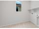 Laundry room with tile floor and utility hookups for dryer and washer at 17643 W Rancho Dr, Litchfield Park, AZ 85340