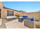 Enjoy outdoor living with a spa, seating, and a modern fire pit feature at 17913 W Sunward Dr, Goodyear, AZ 85338