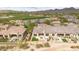 Spacious backyard featuring comfortable seating areas, sleek design, and refined desert landscaping at 17913 W Sunward Dr, Goodyear, AZ 85338
