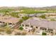 Amazing backyard showcasing an elegant dining table, lounge area, and low-maintenance desert design at 17913 W Sunward Dr, Goodyear, AZ 85338