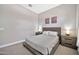 Bedroom features carpet floors and natural wood furnishings at 17913 W Sunward Dr, Goodyear, AZ 85338
