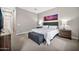 Comfortable bedroom featuring neutral tones, carpet floors, and stylish furnishings at 17913 W Sunward Dr, Goodyear, AZ 85338