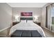 Cozy bedroom featuring a large bed, elegant decor, and ample natural light at 17913 W Sunward Dr, Goodyear, AZ 85338