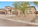 Beautiful two-story home featuring desert landscaping, a paved driveway, and an attached two-car garage at 17913 W Sunward Dr, Goodyear, AZ 85338