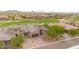 Stunning single-Gathering home boasts a well-maintained exterior with a tile roof and three-car garage at 17913 W Sunward Dr, Goodyear, AZ 85338