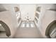 Stunning foyer with high ceilings, arched details, and a decorative chandelier, creating a grand entrance at 17913 W Sunward Dr, Goodyear, AZ 85338