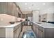 Modern kitchen featuring stainless steel appliances, sleek countertops, and an open concept design at 17913 W Sunward Dr, Goodyear, AZ 85338