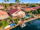 An amazing backyard featuring a pool, lake access and beautiful landscaping from an aerial view at 186 N Starboard Dr, Gilbert, AZ 85234