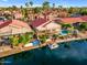 A beautiful home with lush landscaping, pool, and lake access with a boat dock at 186 N Starboard Dr, Gilbert, AZ 85234