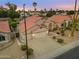Stunning aerial view of a home featuring a three-car garage, well-manicured landscaping, and a Spanish tile roof at 186 N Starboard Dr, Gilbert, AZ 85234