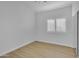 Neutral bedroom with wood floors and window at 186 N Starboard Dr, Gilbert, AZ 85234