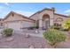 Charming single-story home with a well-maintained yard and a two-car garage at 186 N Starboard Dr, Gilbert, AZ 85234