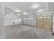Spacious, clean garage with multiple doors and ample lighting at 186 N Starboard Dr, Gilbert, AZ 85234