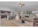 Inviting living room with open access to the kitchen, complemented by hardwood floors and plenty of natural light at 186 N Starboard Dr, Gilbert, AZ 85234
