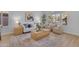 Inviting living area with modern furniture, decorative throw pillows, stylish decor, and lots of natural light at 186 N Starboard Dr, Gilbert, AZ 85234