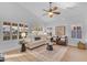 Bright and cozy living space with hardwood floors, modern furniture, and natural light streaming through plantation shutters at 186 N Starboard Dr, Gilbert, AZ 85234