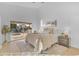 Bright main bedroom with pool views, vaulted ceilings, neutral tones, and an ensuite bathroom at 186 N Starboard Dr, Gilbert, AZ 85234