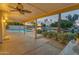 Covered patio with a view of the pool, landscaping and canal at 186 N Starboard Dr, Gilbert, AZ 85234