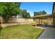 View of backyard showing the covered patio and block wall that provides privacy at 1918 E Anchor Dr, Gilbert, AZ 85234