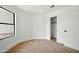 Spacious bedroom with plush carpeting and a closet with sliding doors for convenient storage at 1918 E Anchor Dr, Gilbert, AZ 85234