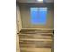 Spacious bedroom with wood plank flooring and ample natural light at 19601 N 7Th N St # 1032, Phoenix, AZ 85024