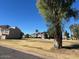 Community with large grassy open space and tall trees at 19601 N 7Th N St # 1032, Phoenix, AZ 85024