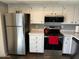 Bright kitchen boasting stainless steel appliances and white cabinetry, offering functionality at 19601 N 7Th N St # 1032, Phoenix, AZ 85024