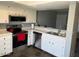 Updated kitchen with stainless steel appliances, white cabinets, and marble countertops at 19601 N 7Th N St # 1032, Phoenix, AZ 85024