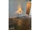Cozy living room featuring a rustic tile floor and an accent table with a lamp at 19601 N 7Th N St # 1032, Phoenix, AZ 85024
