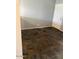 Neutral living space with slate floors, light walls and bright white door at 19601 N 7Th N St # 1032, Phoenix, AZ 85024