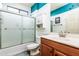 Bathroom features a glass enclosed shower, white vanity, and clean lines offering a soothing space at 20183 N Big Dipper Dr, Maricopa, AZ 85138