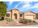 Charming single-story home with a two car garage and a low maintenance desert landscape at 20183 N Big Dipper Dr, Maricopa, AZ 85138