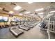 Spacious fitness center with treadmills and other exercise equipment and TVs at 20183 N Big Dipper Dr, Maricopa, AZ 85138
