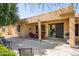 Inviting covered patio with outdoor seating and dining, with easy access to the lush backyard and grill at 20183 N Big Dipper Dr, Maricopa, AZ 85138