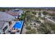 Expansive aerial view of a beautiful home with a pool, fire pit, and desert landscaping, showcasing the property's outdoor appeal at 20373 W Coolidge St, Buckeye, AZ 85396