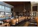 Upscale bar area features ample seating, a well-stocked bar, and modern lighting at 20373 W Coolidge St, Buckeye, AZ 85396
