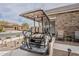 Golf cart parked in the driveway, offering easy access to the golf course and enhancing the property's recreational appeal at 20373 W Coolidge St, Buckeye, AZ 85396