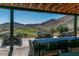 Beautiful outdoor patio area offering stunning golf course and mountain views, ideal for relaxation and entertainment at 20373 W Coolidge St, Buckeye, AZ 85396