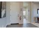 Elegant entryway featuring neutral walls, decorative tile flooring, and recessed lighting at 20445 W Rovey Ave, Buckeye, AZ 85396