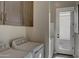 Laundry room equipped with washer, dryer, and cabinet storage at 20445 W Rovey Ave, Buckeye, AZ 85396