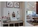 Inviting mudroom featuring coat rack, bench with storage, and decor at 20445 W Rovey Ave, Buckeye, AZ 85396