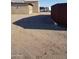 Gravel driveway area with ample space for parking and storage, set in a sunny outdoor setting at 22744 E Carla Vista Dr, Mesa, AZ 85212
