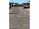 Gravel lot with gated parking at 22744 E Carla Vista Dr, Mesa, AZ 85212