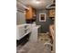 Well-equipped laundry room with washer, dryer, cabinetry, and countertop space at 22744 E Carla Vista Dr, Mesa, AZ 85212